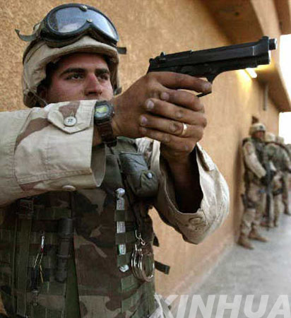 us-soldier-with-pistol-and-handcuffs